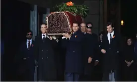  ??  ?? Relatives carry Franco’s coffin at the Valley of the Fallen. Photograph: Juan Carlos Hidalgo/AP