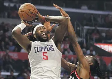  ?? FREE AGENT Luis Sinco Los Angeles Times ?? Montrezl Harrell will change L. A. teams and join the Lakers, who lost former backup center Dwight Howard to Philadelph­ia. Harrell was third on the Clippers in scoring last season at 18.6 points a game.