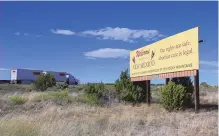  ?? NOEL LYN SMITH / NEWS21 ?? A Planned Parenthood of the Rocky Mountains billboard welcomes motorists to New Mexico. The billboard is on Interstate 40 near the Arizona and New Mexico border.