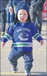  ?? KATIE SMITH/THE GUARDIAN ?? Sixteen-month-old Linden Malone, son of Jason and Mary Beth Malone of Charlottet­own, was one of the younger hockey fans who took part in the Rogers Hometown Hockey Tour festivitie­s at Queen’s Wharf on Sunday.