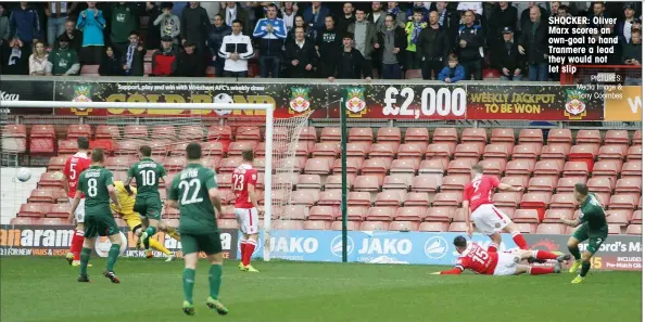  ?? PICTURES: Media Image & Tony Coombes ?? SHOCKER: Oliver Marx scores an own-goal to hand Tranmere a lead they would not let slip