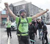  ??  ?? Eamonn Donnelly arrives in Keady last night after he completed his 2,500km walk around Europe to raise awareness about dementia.