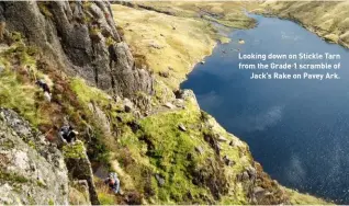  ??  ?? Looking down on Stickle Tarn from the Grade 1 scramble of Jack’s Rake on Pavey Ark.