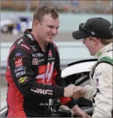  ?? TERRY RENNA - AP FILE ?? Cole Custer, left, pictured last season, won Saturday’s Xfinity Series race in Fontana, Calif.