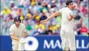  ?? AFP ?? Nathan Lyon catches a screamer to dismiss England’s Moeen Ali in Adelaide on Monday.