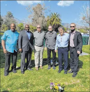  ?? Terry Cottle ?? Former UNLV football players and assistant coaches paid respects to ex-Rebels coach Wayne Nunnely at a graveside ceremony Friday in his hometown of Monrovia, California. Doc Wise, from left, Tommy Jackson, Terry Cottle, Randy Whitsitt, Steve Kadoich, Steve Stallworth.