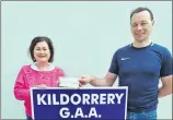  ?? ?? Adrienne Fitzgerald presenting Mike Monaghan, Kildorrery with his prize winner’s cheque for winning the local lotto recently. Congrats Mike. Enjoy!