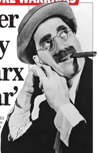  ?? ?? BEYOND A JOKE: Groucho with his trademark cigar, which is now subjected to a warning notice