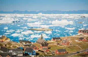  ?? CARSTEN SNEJBJERG/THE NEW YORK TIMES ?? Greenland, renowned for its icy fjords, aims to energize its economy with tourism.