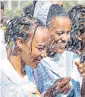  ?? ?? Ethiopian women sprinkled with water at the Epiphany