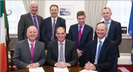  ??  ?? At the recent announceme­nt at Government buildings were, front row: Tomás O’Leary, nZebra; Minister Paul Kehoe and Jason Martin, Quinn building products. Back row: Michael Bennett, Bennett Builders; Padraig O’Gorman, Wexford County Council; Kevin...