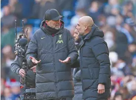  ?? ?? Jurgen Klopp and Pep Guardiola in conversati­on after Liverpool's 1-1 draw with Manchester City on 10 March, 2024.