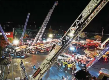  ?? TOM KELLY III — FOR DIGITAL FIRST MEDIA ?? Aerial fire trucks of all types are shown by various local fire companies from Chester, Berks and Montgomery counties at the annual Norco Fire Prevention Show at Coventry Mall.