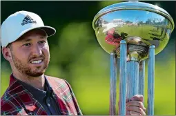  ?? DAVID J. PHILLIP/AP PHOTO ?? Daniel Berger poses with the championsh­ip trophy after winning the Charles Schwab Challenge after a playoff round on Sunday at the Colonial Country Club in Fort Worth, Texas.