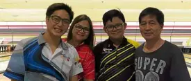  ?? —ABEL ULANDAY ?? (From left) Jason Ko, Myra Umali, Juancho Calumpong and Ver Nido teamed up to rule the 32nd Pusoyan tournament of the Sta. Lucia East Tenpin Bowling Associatio­n (Sletba) held recently at Sta. Lucia Bowling Center in Cainta, Rizal. A total of 19 teams...