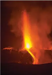  ??  ?? Mount Etna, Europe’s most active volcano, spews lava during an eruption, near the Sicilian town of Catania, southern Italy, on Tuesday.