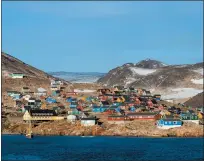  ?? GETTY IMAGES ?? Ittoqqorto­ormiit is the most remote outpost in Greenland’s already very remote landscape.