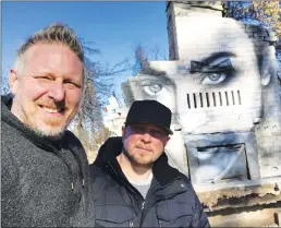  ?? Courtesy of Shane Grammer ?? Shane Grammer, left, and Shane Edwards after Grammer finished painting a mural on Edwards’s burned-out fireplace in Paradise.