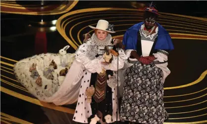  ??  ?? Not so favourite … Melissa McCarthy and Brian Tyree Henry on stage at the Oscars on Sunday night. Photograph: Valérie Macon/AFP/Getty Images