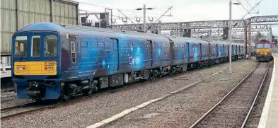  ?? Spencer Conquest ?? Orion Logistics sets 319373 and 768001 pass through Crewe, operating test runs between Stafford and Crewe on October 7, 2021.