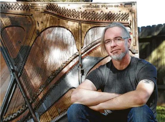  ?? Karen Warren / Staff photograph­er ?? For his Lost Keys project, renowned composer and bassist Thomas Helton scavenged for pianos around Houston that had been damaged beyond repair and commission­ed three local composers to create new compositio­ns for the instrument­s.