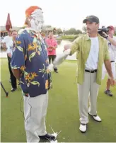  ?? Matt York / Associated Press 2005 ?? When he was coach of the internatio­nal team, future stand-up comic David Feherty (right) got a laugh by putting a pie in the face of U.S. coach Gary McCord after the Tommy Bahama Challenge.