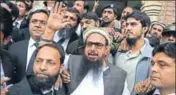  ?? AP FILE ?? Jamaatudda­wa chief Hafiz Saeed outside a court in Lahore.