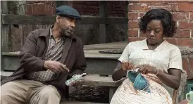  ??  ?? Troy (Denzel Washington) and his wife Rose (Viola Davis) in ‘Fences’
