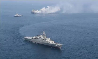  ?? Photograph: Wana News Agency/Reuters ?? Iranian warships are seen during a joint naval exercise with Russian navy in the Indian Ocean in February.