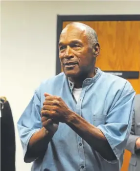  ?? Jason Bean, Getty Images ?? O.J. Simpson, 70, is relieved Thursday after learning that he has been granted parole at the Lovelock Correction­al Center in Lovelock, Nev.