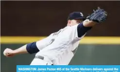  ?? — AFP ?? WASHINGTON: James Paxton #65 of the Seattle Mariners delivers against the Houston Astros in the second inning at Safeco Field on July 30, 2018.