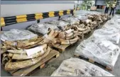  ?? PROVIDED TO CHINA DAILY ?? Seized elephant tusks are displayed by customs authoritie­s in Hong Kong in 2012.