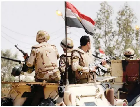  ??  ?? Egyptian soldiers stand guard in northern Sinai in this undated file photo. (Reuters)