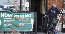  ?? NAM Y. HUH / AP ?? The number of Americans applying for jobless aid ticked up slightly last week but the total number of Americans collecting benefits remained at its lowest level in more than five decades.