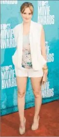  ?? Jason Merritt Getty Images ?? LEIGHTON MEESTER is sleeveless and summery at MTV Movie Awards.