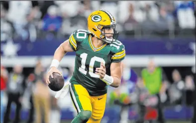  ?? Sam Hodde The Associated Press ?? Packers quarterbac­k Jordan Love made the most of his first postseason start, throwing for 272 yards and three touchdowns without an intercepti­on in a 48-32 victory over Dallas.