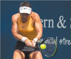  ?? AP PHOTO ?? Simona Halep returns a shot from Ekaterina Alexandrov­a at the Western & Southern Open in Mason, Ohio on Wednesday.