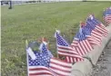  ?? BY HOLLY JENKINS ?? Rappahanno­ck County High School, its “loop” ringed with American flags to mark Veterans Day.