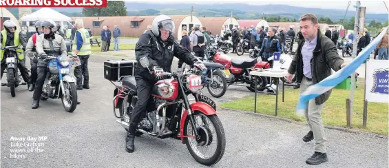  ??  ?? Away day MP Luke Graham waves off the bikers