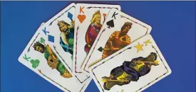  ??  ?? Five Crowns takes gin rummy and gives it a twist. With five suits — including stars — and wild cards galore, it’s mind-bending fun.