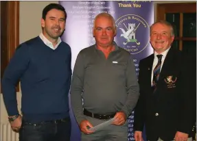  ??  ?? Alan Mullen, overall winner of the Laytown &amp; Bettystown Golf Club Winter League, is presented with his prize by the sponsor Mark Doran (Jack Doran Motors) and Captain Bryan Collins.