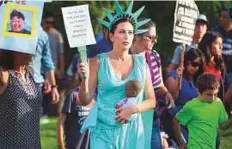  ?? AFP ?? Critics of US government policy during a ‘Families Belong Together March’, in downtown Los Angeles, on Thursday.