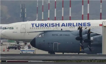  ??  ?? A Royal Air Force plane at Istanbul Airport on 21 April which reportedly brought the 400,000 gowns from Turkey. Photograph: Ibrahim Mase/AP