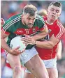  ??  ?? CLASH Powter with O’shea of Mayo in 2017 qualifier tie