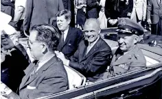  ??  ?? President John F. Kennedy, John Glenn and General Leighton I. Davis ride together during a parade three days after Glenn's historic first U.S. orbital spacefligh­t, in Cocoa Beach, Florida. Courtesy NASA