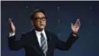  ?? MANDEL NGAN/AFP/GETTY IMAGES ?? Toyota President Akio Toyoda speaks at CES on Monday.