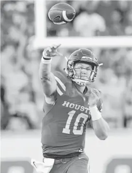  ?? Elizabeth Conley / Houston Chronicle ?? Kyle Allen has started all three of UH’s games with two of them wins, but he has committed six turnovers, including four intercepti­ons.