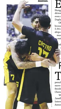  ?? ?? JAYSON CASTRO is hugged by teammates after he makes the Game 3 clincher from downtown.