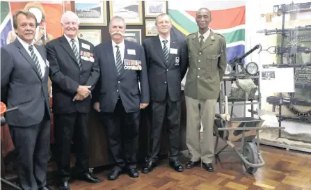  ??  ?? FIVE Natal Mounted Rifles commanding officers. From left, Lieutenant-Colonels Alec van Rooyen, Bruce Hearn, Pat Acutt and Mike Rowe, and Lieutenant-Colonel Siyanda Cele.