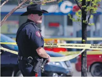  ?? RYAN MCLEOD/FILES ?? Calgary has experience­d 27 homicides this year, with 18 of those committed since June 2, putting added pressure on investigat­ors in the Calgary police major crime unit.